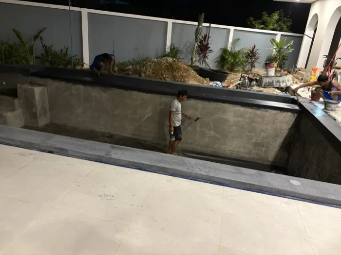 Private Villa, Pasak — working along the long wall with the coping in place