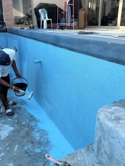 Private Villa, Pasak — laying the Aquamarine onto the pool wall