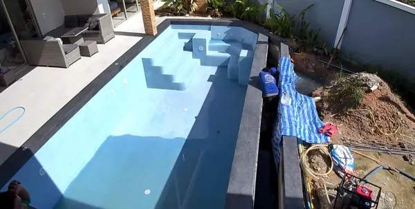 Private Villa, Pasak — the finished pool, with work continuing on the surge tank