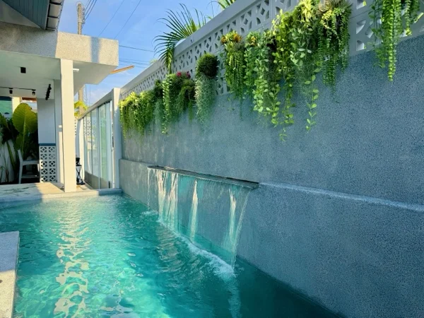 Private Villa, Nai Yang — the water feature along the pool wall