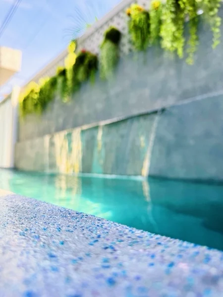 Private Villa, Nai Yang — blue glass in the coping beside the water feature
