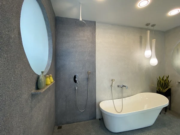 Private Villa, Nai Yang — the bathroom wall in a custom PebbleCrete finish