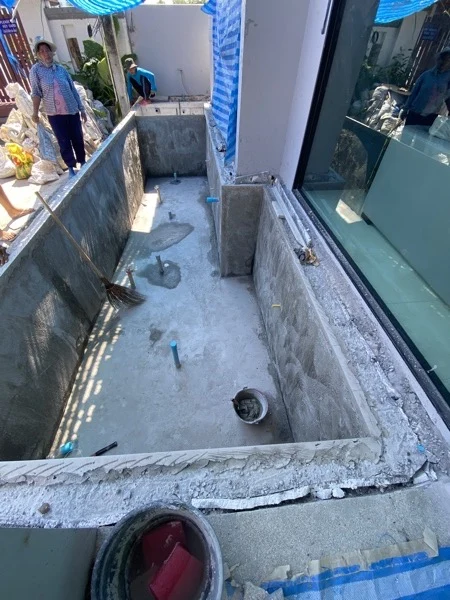 Private Villa, Nai Yang — the glass panel bedded into the pool wall