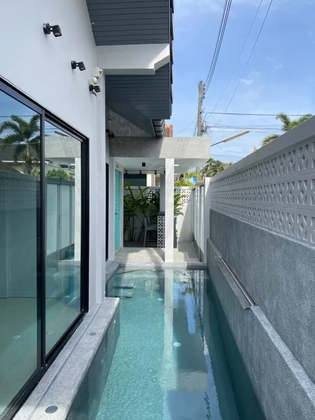 Private Villa, Nai Yang — the pool along the glass wall