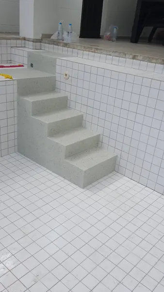 Private Villa — New Pool Steps — the new steps in PebbleCrete Supreme Halo Pearl
