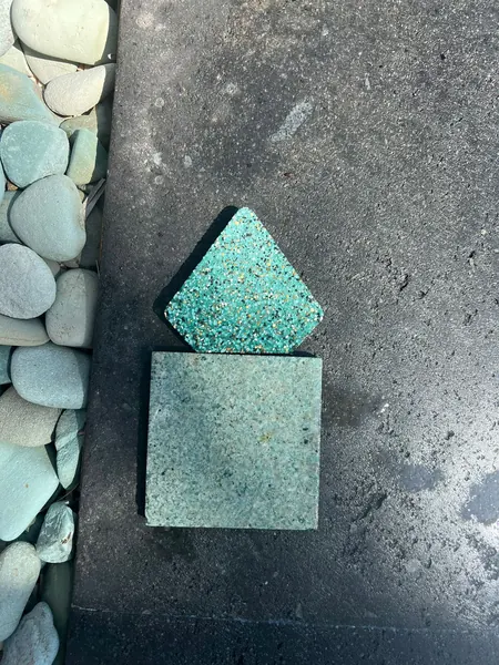 Private Villa, Red Palm — Irish Green — choosing PebbleCrete against the original Sukabumi stone
