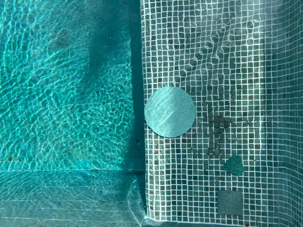 Private Villa, Red Palm — Irish Green — samples under water against the old finish