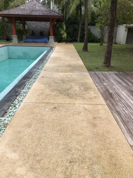 Private Villa, Red Palm — Irish Green — the walkway beside the finished pool