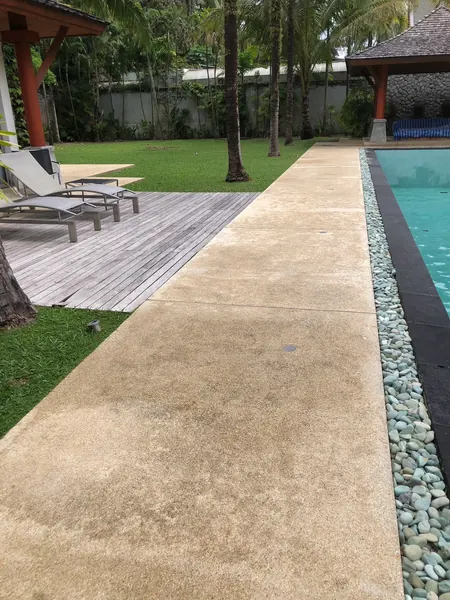 Private Villa, Red Palm — Irish Green — the pool edge and the walkway