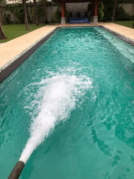Private Villa, Red Palm — Irish Green — filling the pool