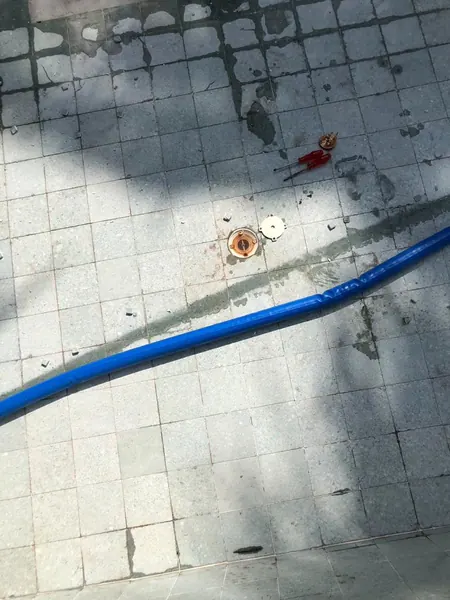 Private Villa, Red Palm — Irish Green — the floor stripped around the drain