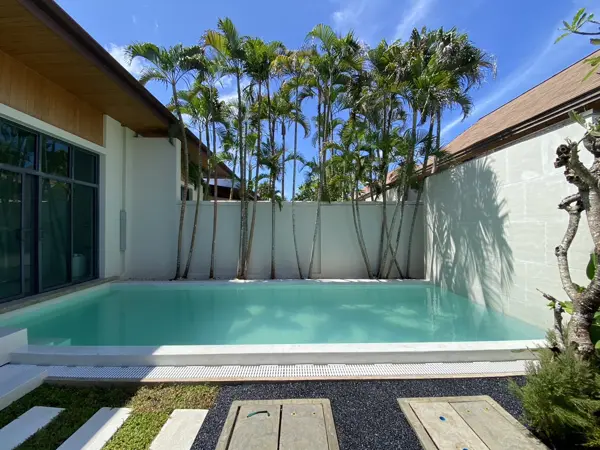 Private Villa, Rawai — Pearl White — the pool, the villa and the boundary wall
