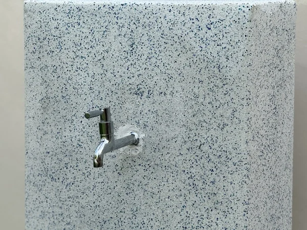 SAii Phi Phi — a tap panel clad in PebbleCrete Supreme Arctic Blue