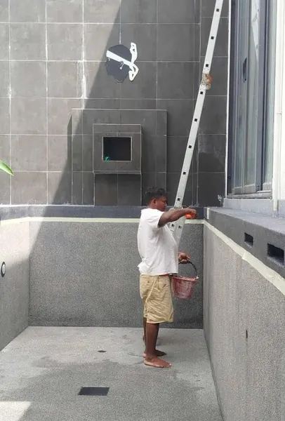 Sea Stone Private Pool Villas — washing the new finish before filling