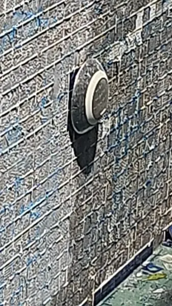 Sea Stone Private Pool Villas — the old pool light in the mosaic wall