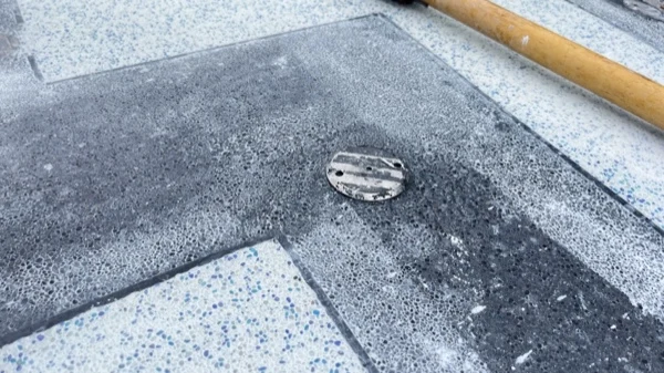 The SIS Kata — a drain set flush into the finished deck