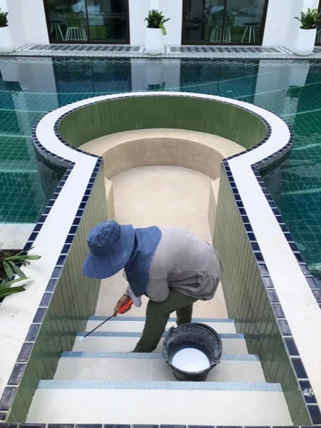 Sugar Marina Lagoon — applying the finish to the sunken seating