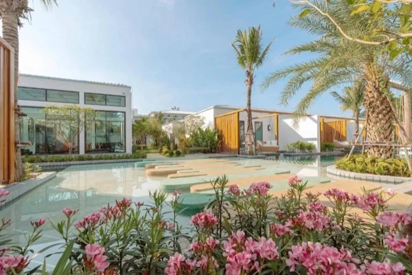 Sugar Marina Lagoon — the splash park behind the flower bed