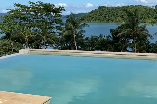 The Estate, Ao Po — the overflow edge and the bay beyond