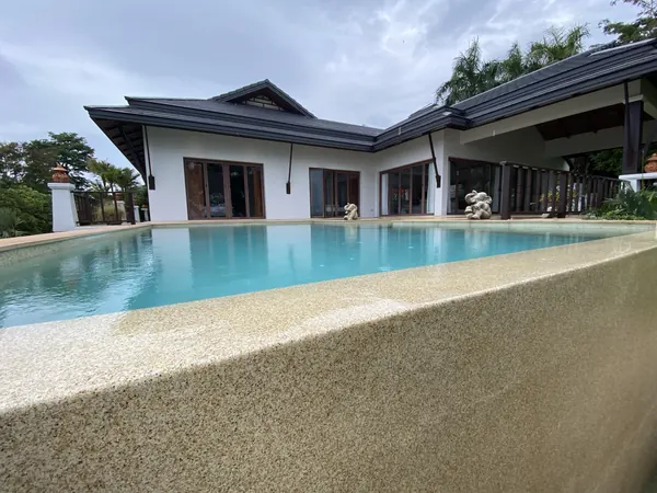 The Estate, Ao Po — the overflow edge and the terrace