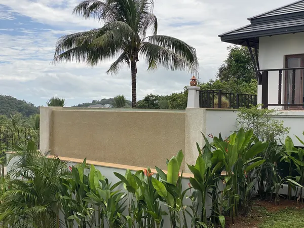 The Estate, Ao Po — the outer wall of the pool from the garden