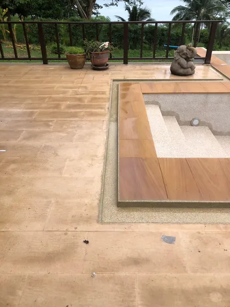The Estate, Ao Po — the steps and sandstone coping before filling