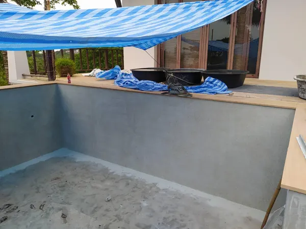 The Estate, Ao Po — the shell rendered and ready for the finish