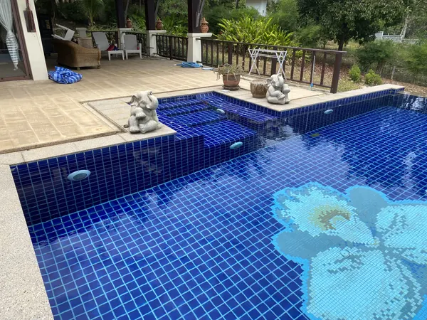 The Estate, Ao Po — the old pool with its tiled flower motif