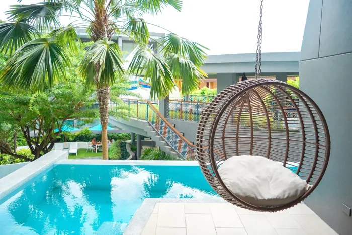 The SIS Kata — the hanging chair beside the pool