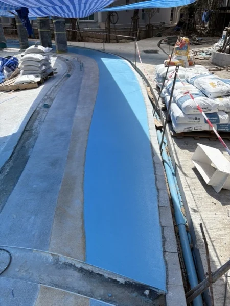 Title Serenity — the blue zone laid, material still stacked