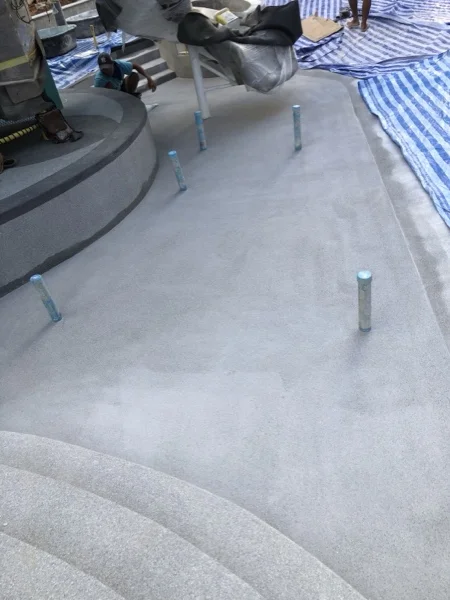 Title Serenity, Nai Yang — the main pool steps and seating in French Grey
