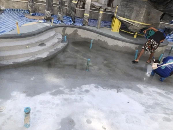 Title Serenity, Nai Yang — applying French Grey to the main pool steps