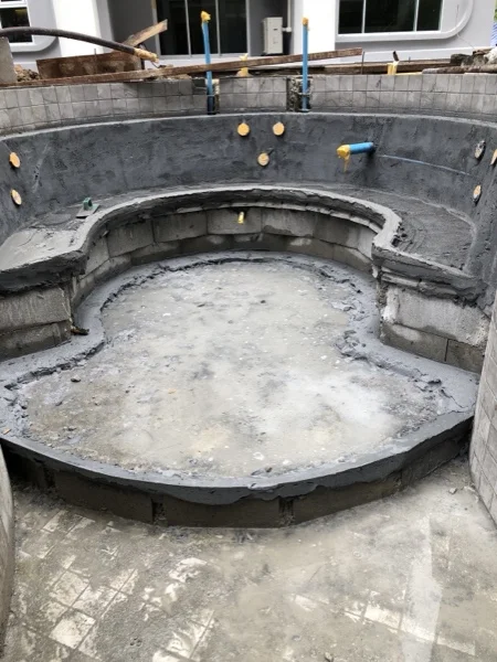 Title Serenity, Nai Yang — the main pool shell with its seating island formed