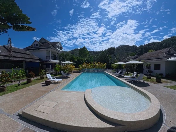 Private Villa, Khao Lak — the curved shallow ledge easing into the water