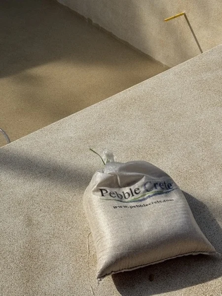 Villa Tantawan Resort, Kamala — a bag of PebbleCrete on the finished surface