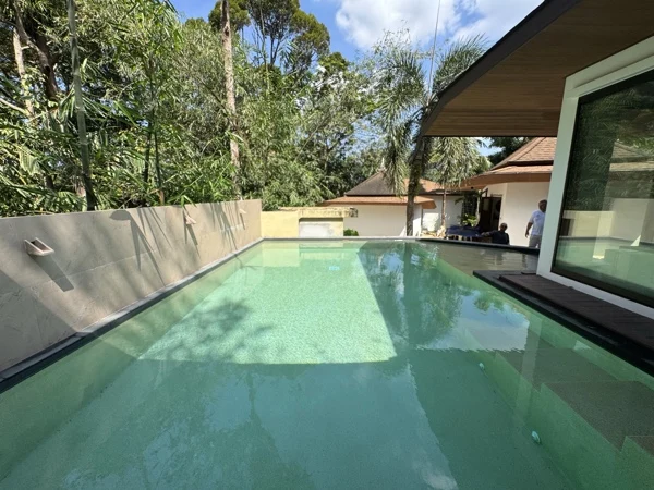 Villa Tantawan Resort — the pool running along the villa