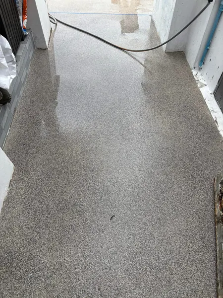 Village Clubhouse — Pool Deck — the new PebbleCrete walkway along the pool