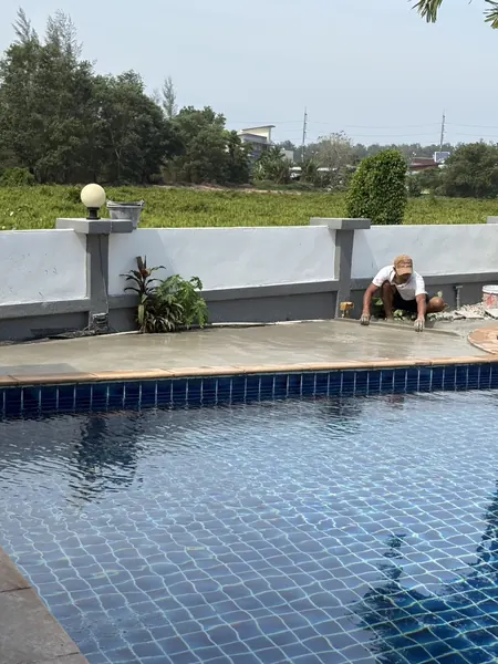 Village Clubhouse — Pool Deck — work at the pool corner