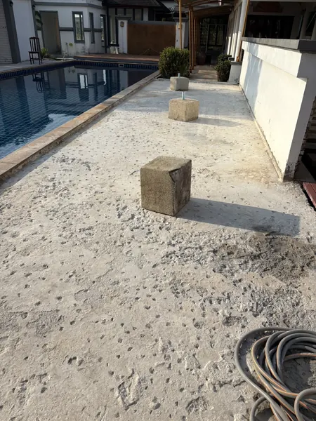 Village Clubhouse — Pool Deck — the old deck surface roughened