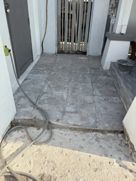 Village Clubhouse — Pool Deck — the old surface taken up by the gate