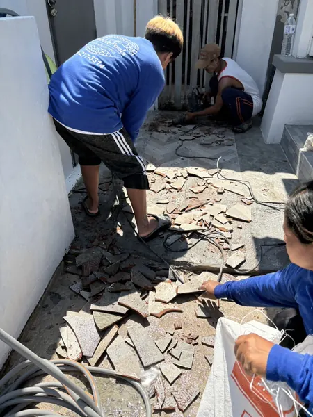 Village Clubhouse — Pool Deck — taking up the old tiles by the gate