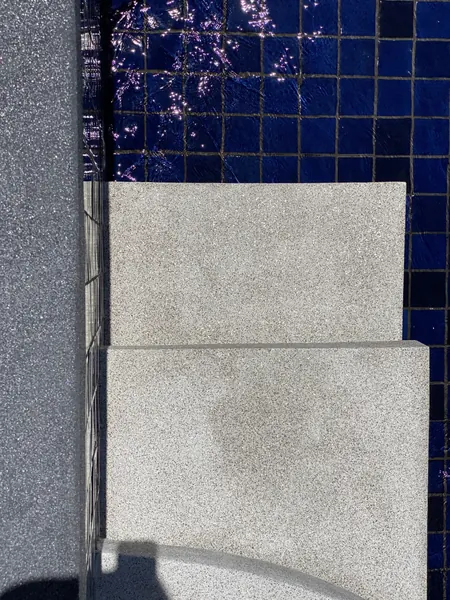 Vista del Mar, Naithon — Sea-View Pool — the steps meeting the tiled pool wall