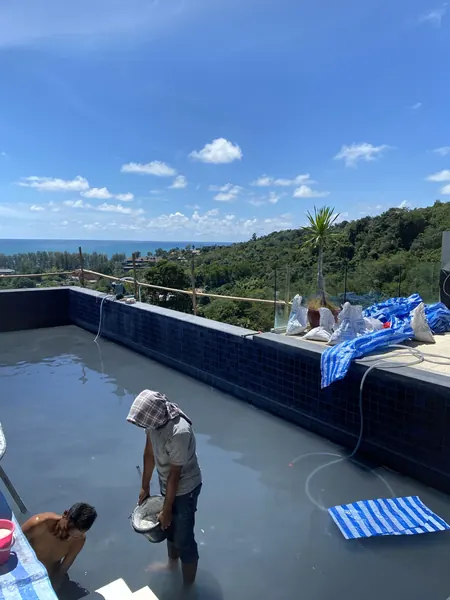 Vista del Mar, Naithon — Sea-View Pool — applying the finish on the steps
