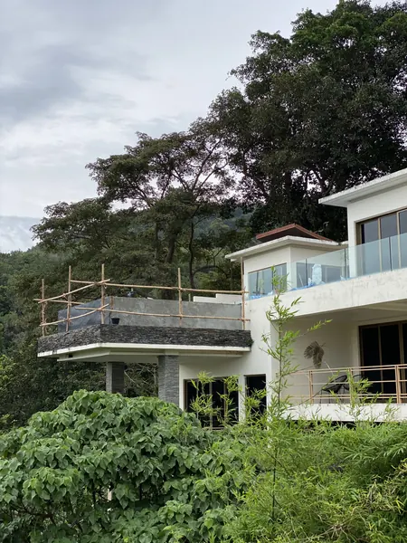 Vista del Mar, Naithon — Sea-View Pool — the villa and the pool from below