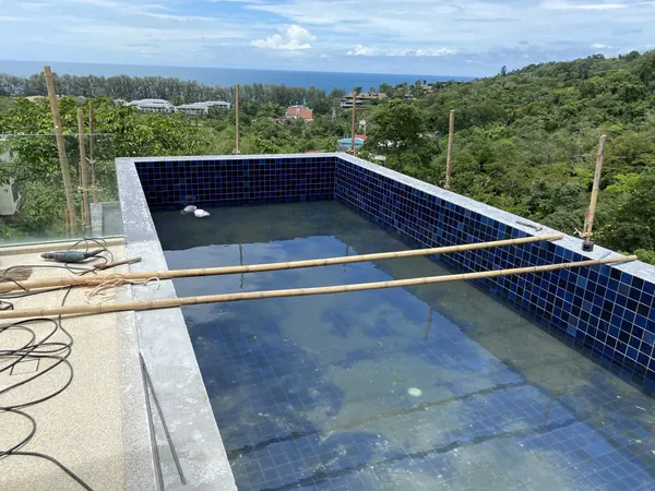 Vista del Mar, Naithon — Sea-View Pool — the prepared coping towards the sea