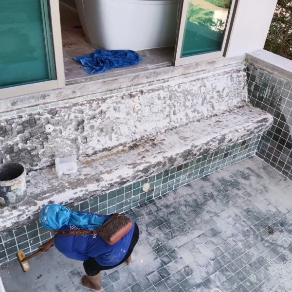 Wyndham Grand Phuket Kalim Bay — chipping the old bench away