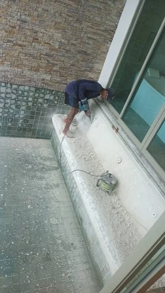 Wyndham Grand Phuket Kalim Bay — working the new surface back with the machine