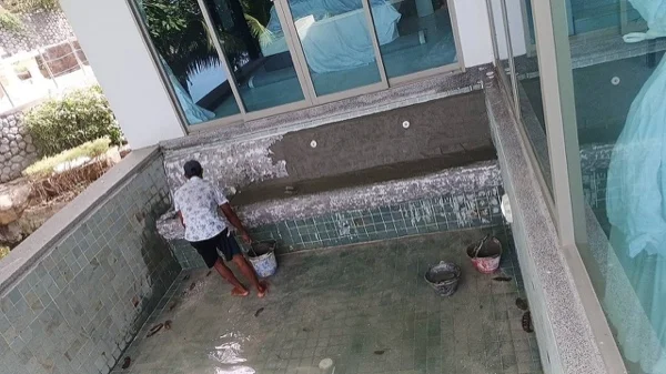 Wyndham Grand Phuket Kalim Bay — working in the drained pool