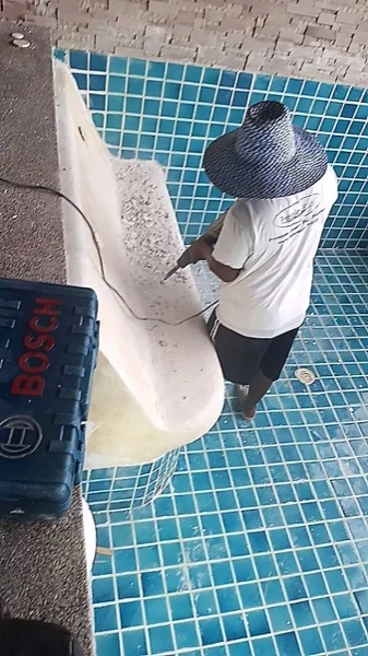 Wyndham Grand Phuket Kalim Bay — grinding the old surface off the unit