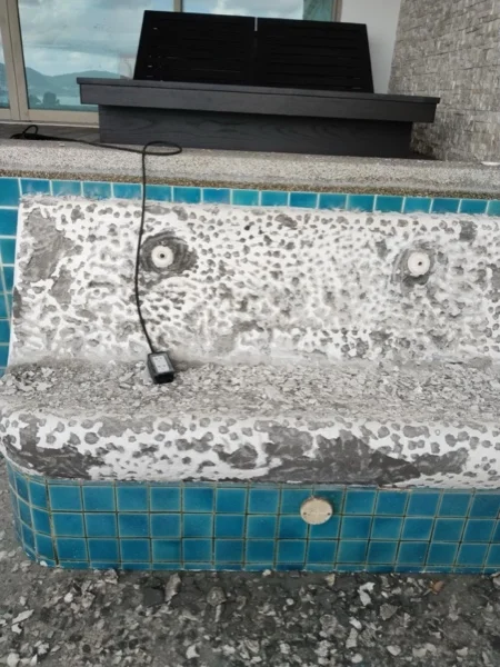 Wyndham Grand Phuket Kalim Bay — the old seating in demolished stage against the existing pool tiling